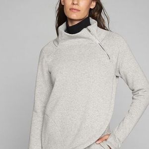 Athlete “karma” funnel neck sweater.